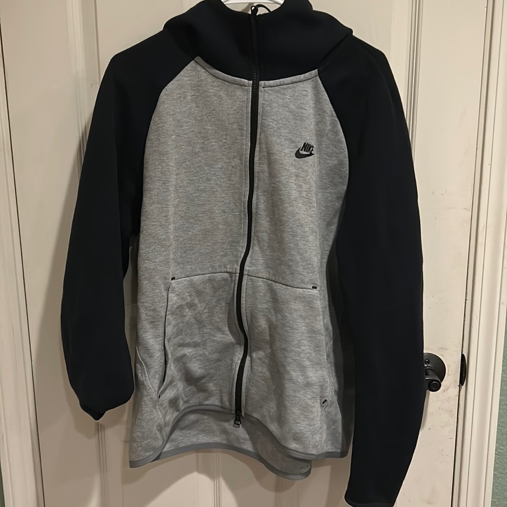 Black and gray Nike zip up with Hood
